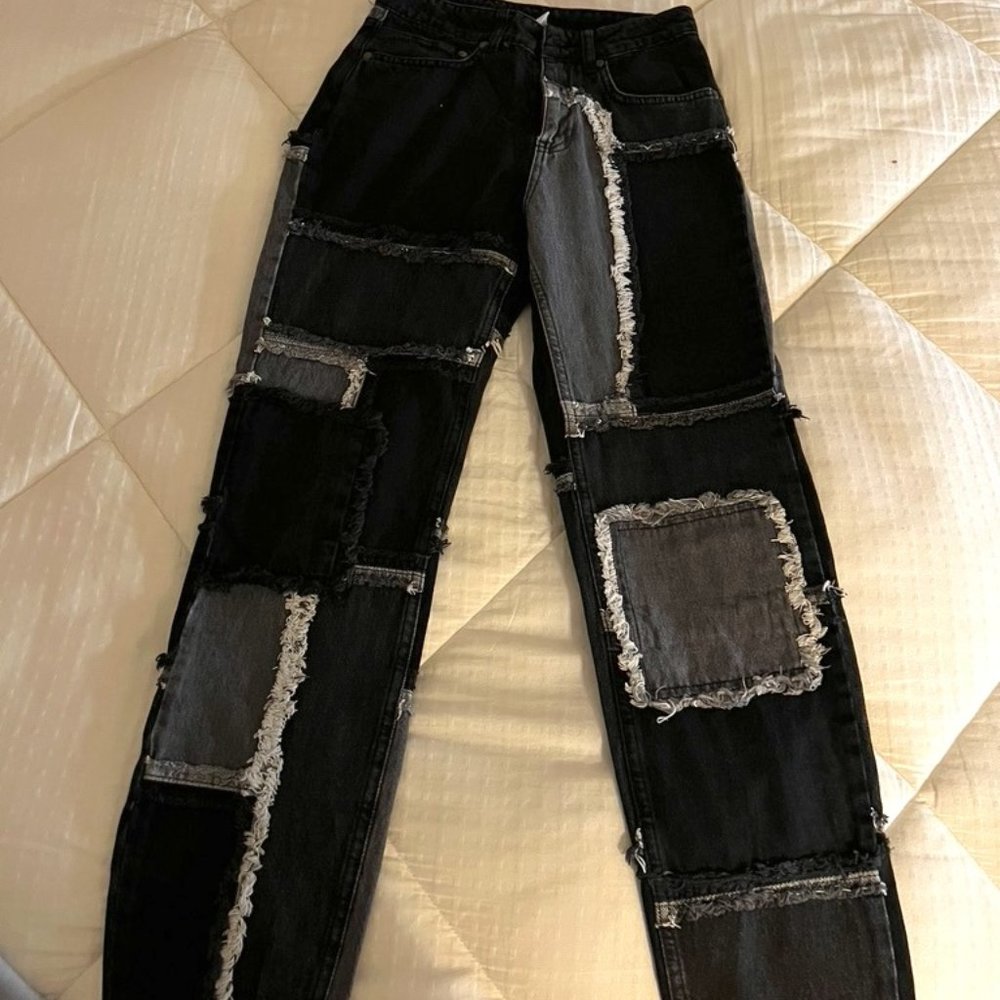 ragged pacthwork black and grey jeans